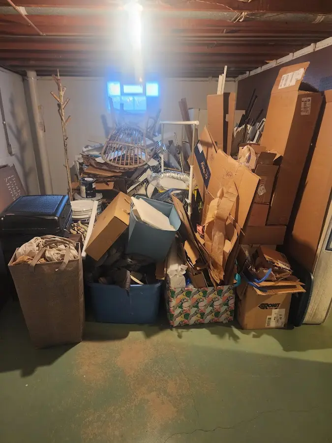 Roll-off dumpster container at job site for 4 Yard Dumpster Rental in Meadows Place